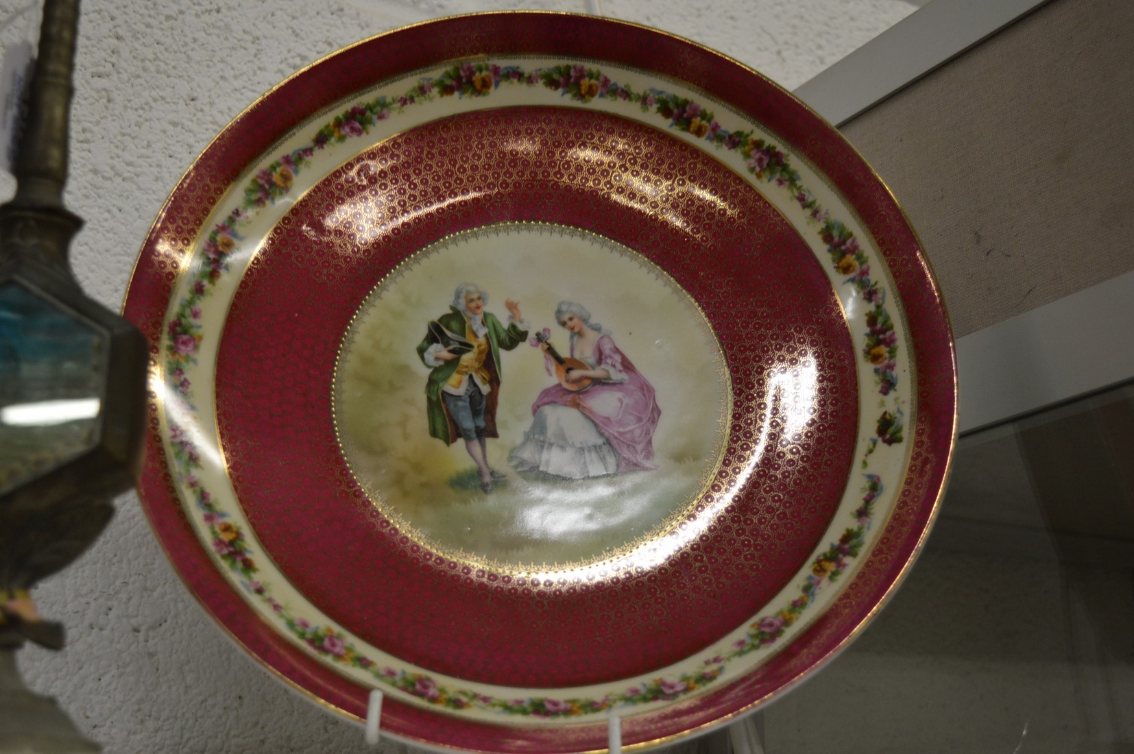 Large pair of Continental porcelain circular dishes painted with figures to the centre. - Image 2 of 4