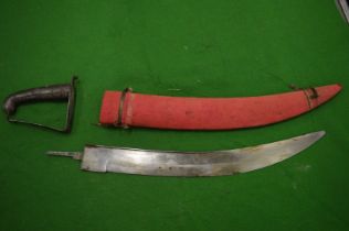 An Eastern dagger and sheath.