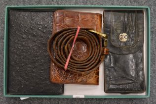 A leather wallet and other items.