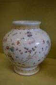 A large Chinese famille rose porcelain vase.