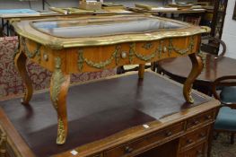 A good Louis XVI style king wood and ormolu mounted vitrine table.