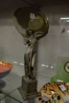 A stylish Art Nouveau pewter table mirror with figural stand.