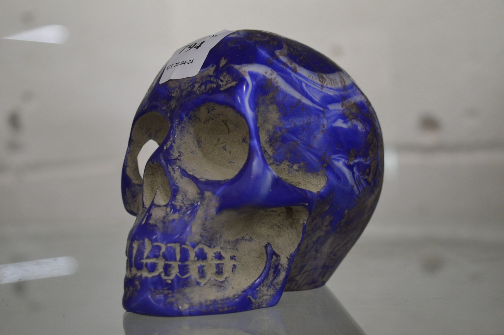 A carved lapis skull.