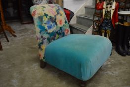 A small upholstered seat.