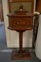 A Victorian pitch pine church offering box on stand.