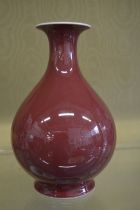 A Chinese Sang de Boeuf vase.