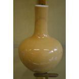 A Chinese yellow glazed bulbous shaped vase.