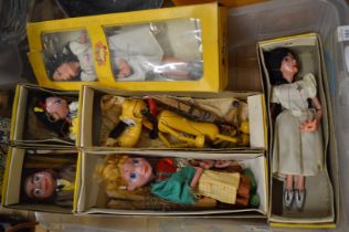 A group of boxed Pelham puppets.