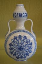 A Chinese blue and white moon flask.