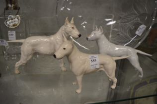 Royal Doulton porcelain model of an English bull terrier and two others similar.