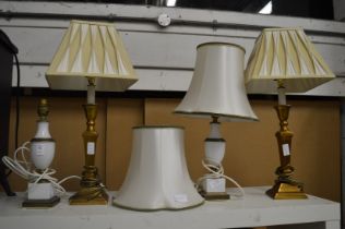Two pairs of table lamps.