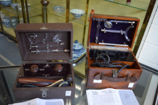 An Everay mahogany high frequency examination machine together with another similar.