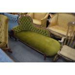 A Victorian style chaise longue.