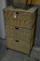 Wicker three drawer chest.