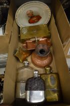 Hip flasks, a brass military box, a copper ashtray mounted with an aeroplane and other items.