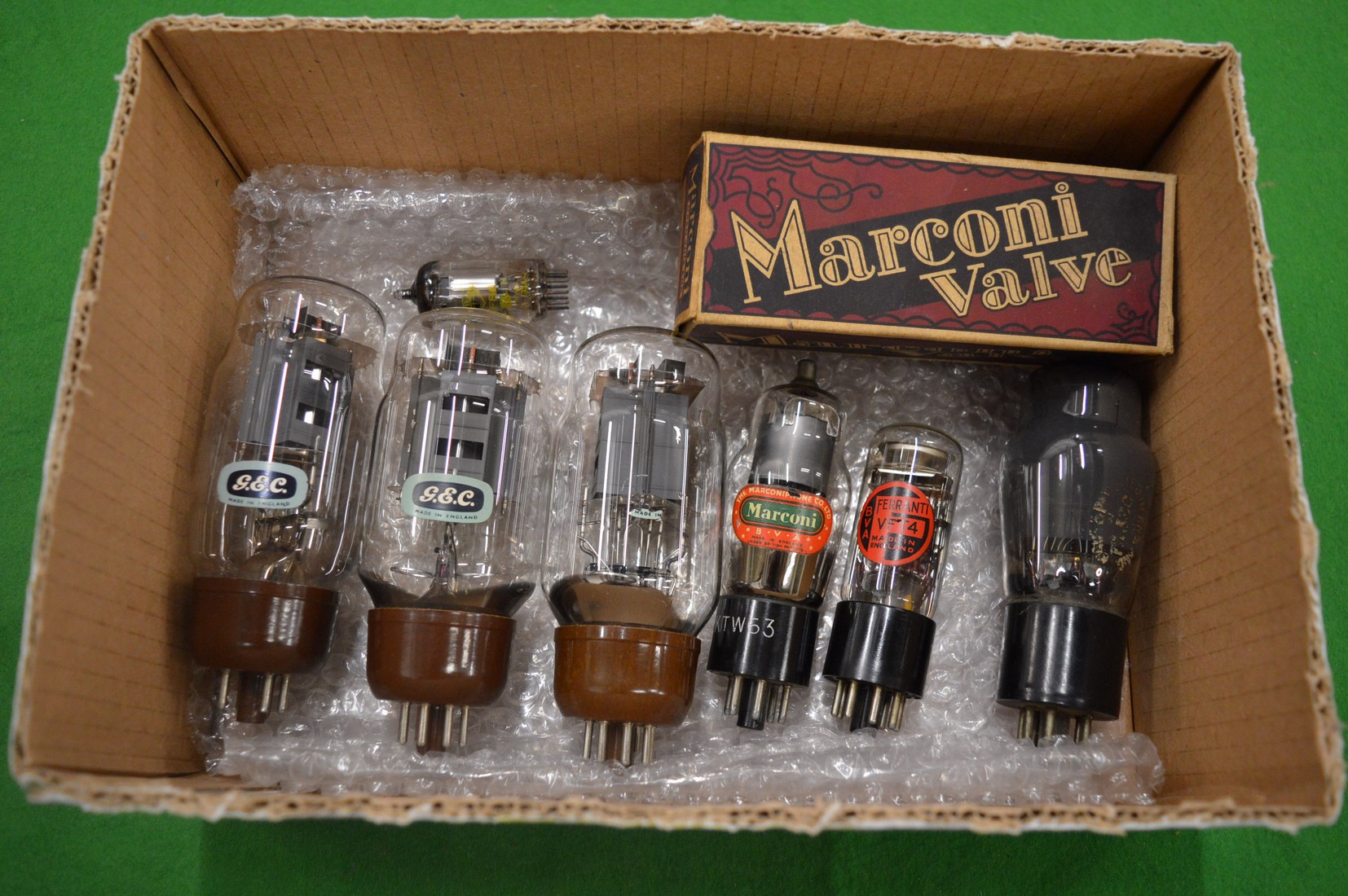 A collection of old radio valves to include GEC KT66 valves x 3, Ferranti VFT4, Marconi KTZ63, KTW63