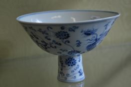 A Chinese blue and white stem cup.