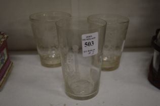 A Masonic glass beaker and pair of etched beakers.