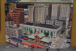An amusing photographic print on canvas depicting a Lego street scene.