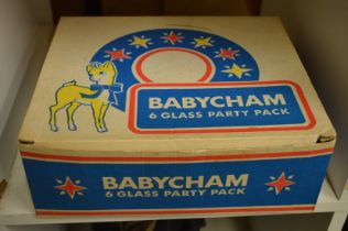 An original box set of six Babycham glasses.