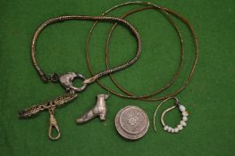 Decorative silver jewellery.