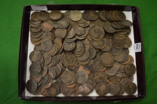 A large quantity of pre-decimal pennies.