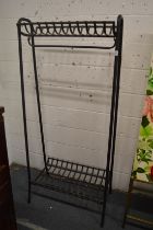 A metal coat/shoe rack.