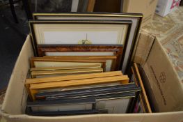 A box of assorted prints.