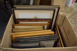 A box of assorted prints.