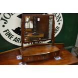 A mahogany dressing table mirror with three drawers to the base.