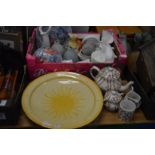 Colourful pottery dish and other decorative china.