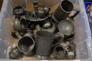 A collection of pewter items.