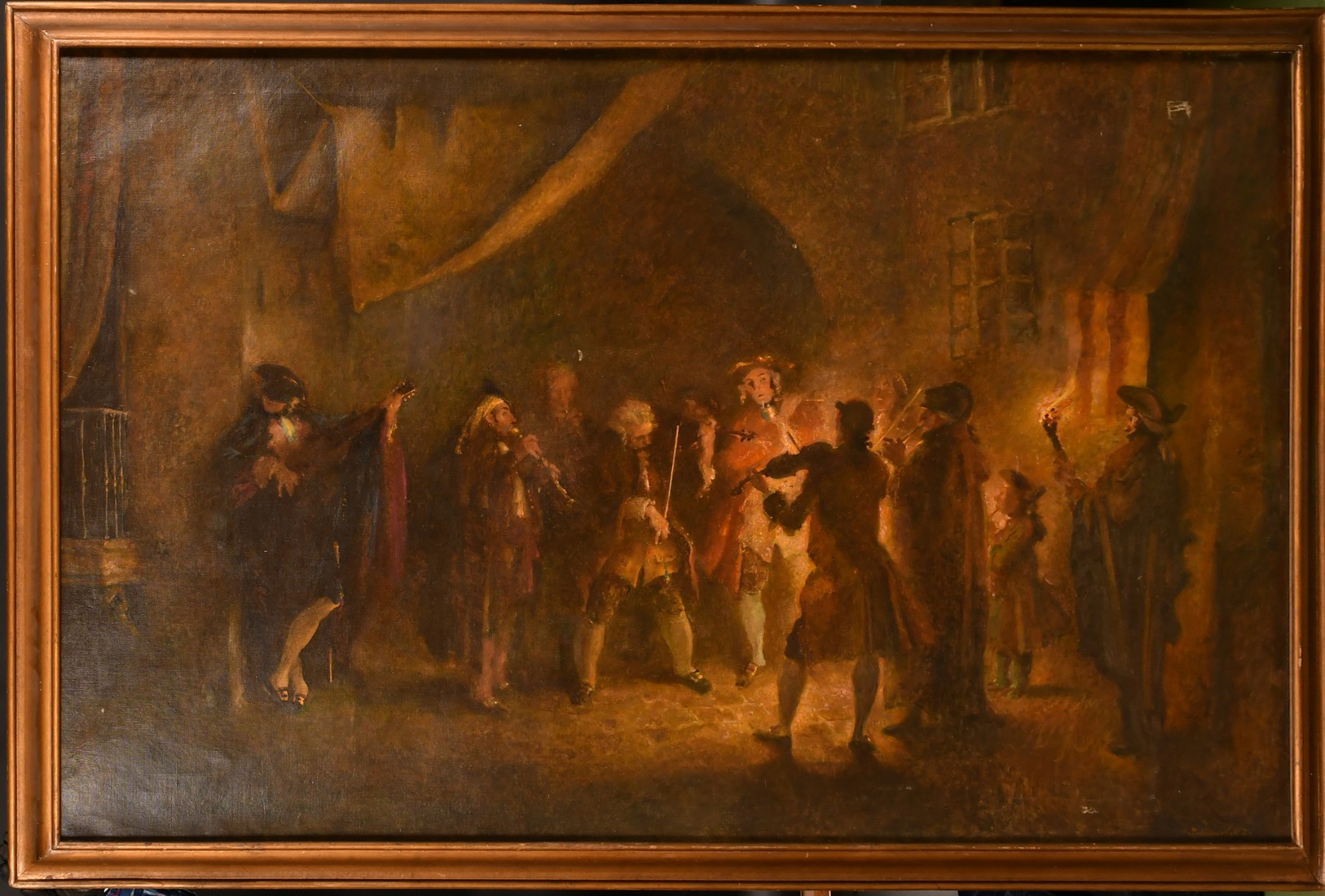 Late 19th Century Continental School, figures in a street playing instruments by firelight, oil on - Image 2 of 4