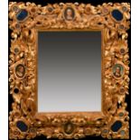 An outstanding early 19th Century carved giltwood frame, rebate size 28" x 22" (71 x 56cm), wide