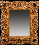 An outstanding early 19th Century carved giltwood frame, rebate size 28" x 22" (71 x 56cm), wide
