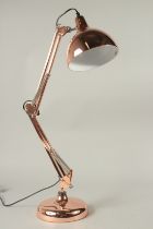 A COPPER ANGLE POISE LAMP.