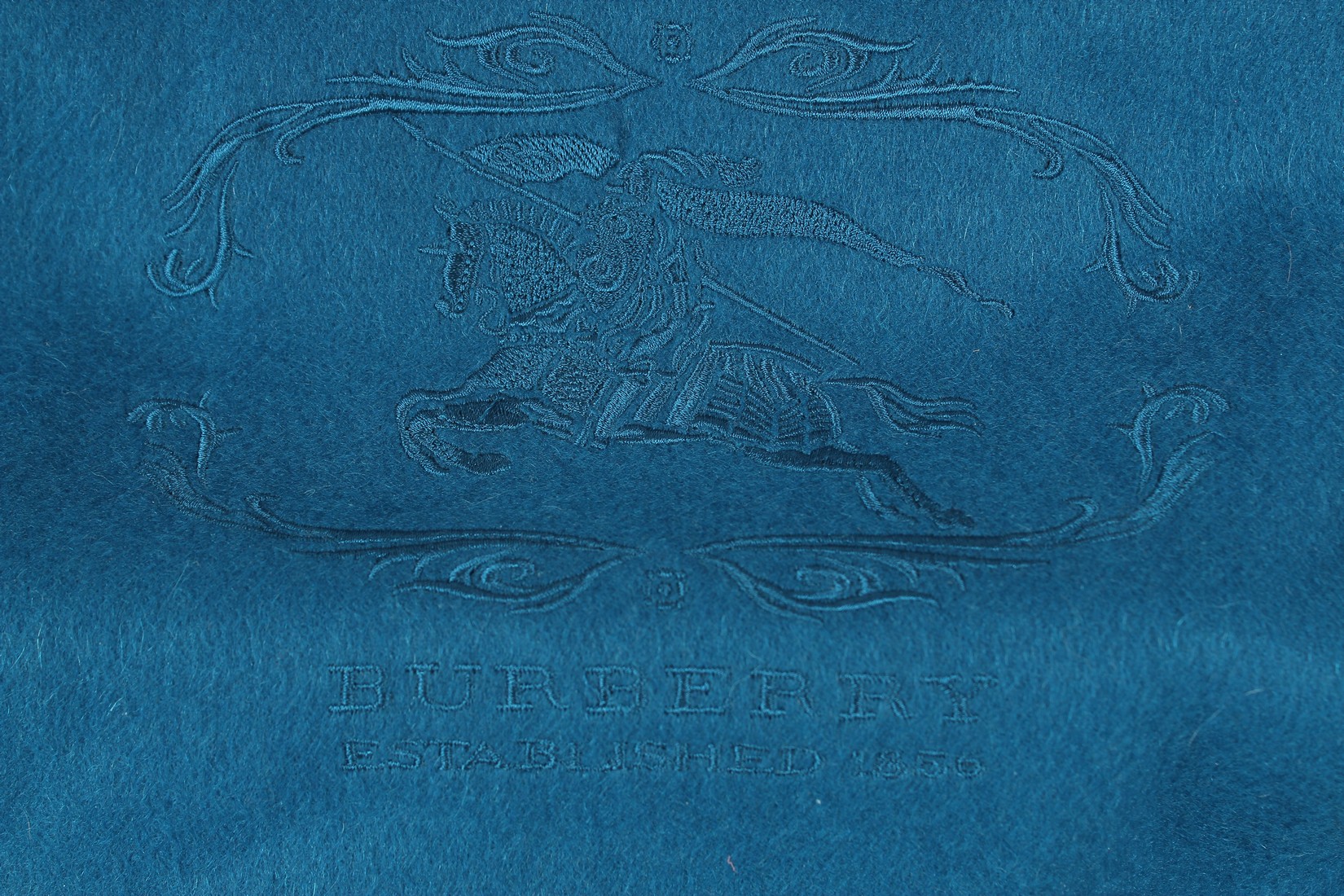 A BURBERRY BLUE WOOL SCARF. 200cms long. - Image 2 of 3