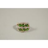 A 14CT YELLOW GOLD, DIAMOND AND GREEN STONE DECORATIVE DRESS RING, size N.