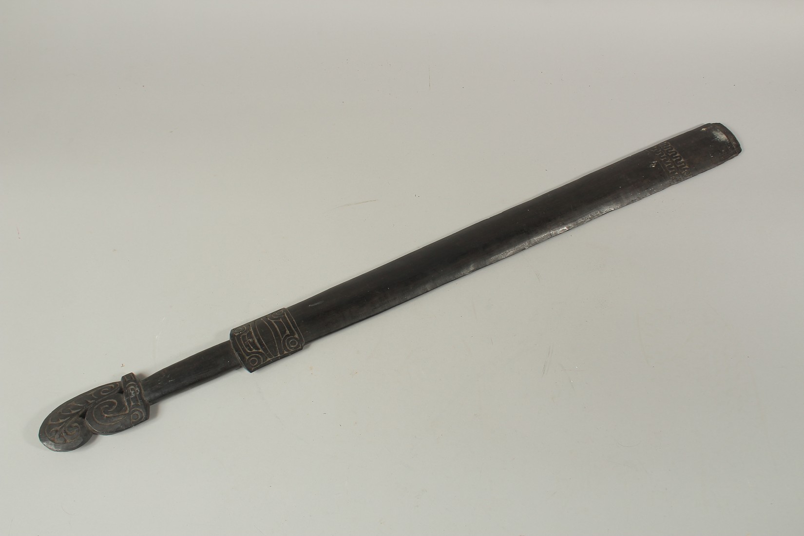 A 19TH CENTURY SWORD CLUB FROM TROBRIAND ISLANDS, PAPUA NEW GUINEA. 33ins long.