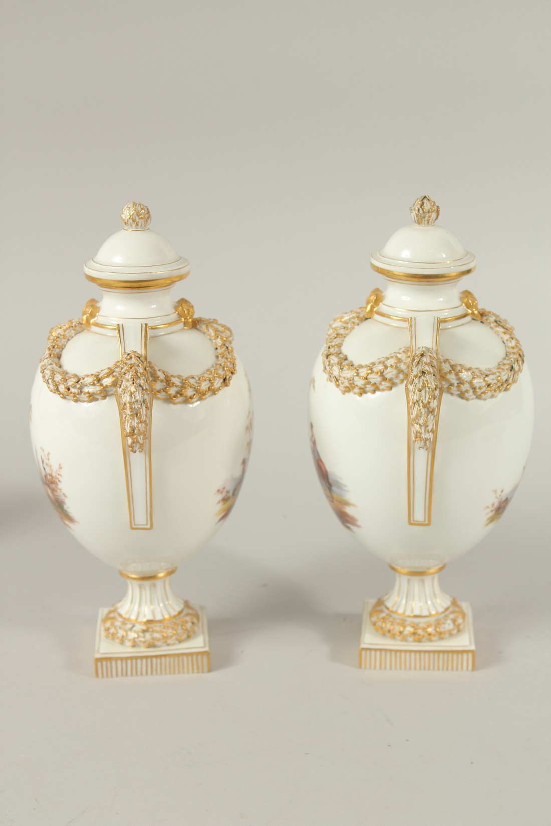 A PAIR OF MEISSEN LIDDED VASES painted with figures in pastoral landscapes. The body of the vases - Image 4 of 8