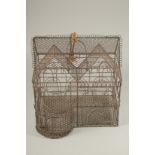 A WIRE WORK BIRD CAGE HOUSE. 12ins high x 11 ins long.