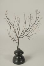 A BLACK CORAL SPECIMEN, 10ins high, on a stand.