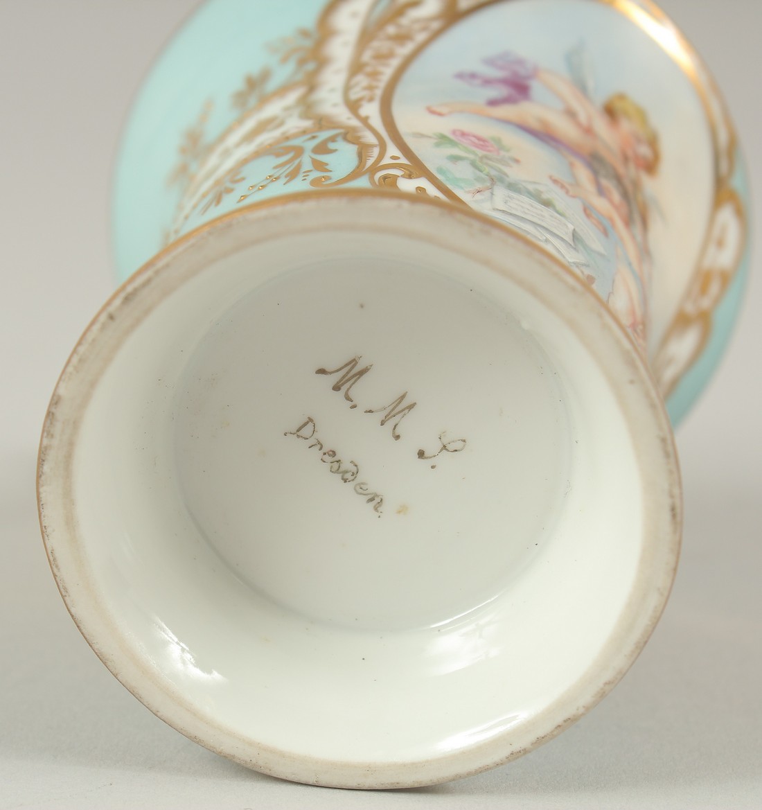 A GOOD DRESDEN CUP AND SAUCER with blue ground, painted with an oval of a two cupids playing - Image 8 of 8