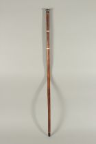 A RARE 19TH CENTURY WALKING STICK with metal top and two screw off sections revealing a long glass