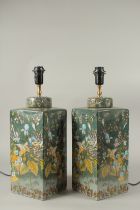 A GOOD PAIR OF PORCELAIN SQUARE LAMPS decorated with parrots and flowers. 50cms high.