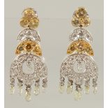 BERGANZA. A GOOD PAIR OF YELLOW AND WHITE GOLD DIAMOND DROP EARRINGS. 1597.