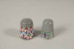 TWO RUSSIAN SILVER AND ENAMEL THIMBLES.