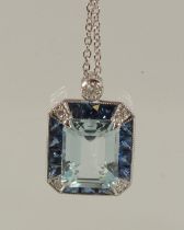 AN 18CT WHITE GOLD, AQUAMARINE AND SAPPHIRE PENDANT AND CHAIN.