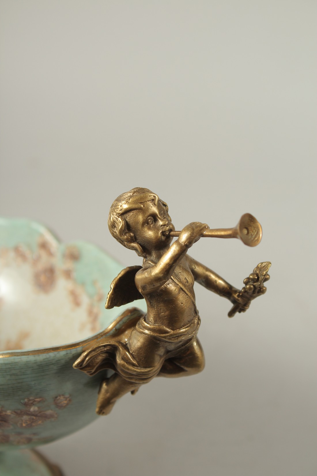 A SEVRES STYLE PORCELAIN AND GILT METAL OVAL COMPORT with cupid handles. 28cms long. - Image 2 of 5
