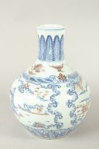 A CHINESE UNDERGLAZE RED AND BLUE PORCELAIN VASE, decorated with scenes of figures. 29cms high.